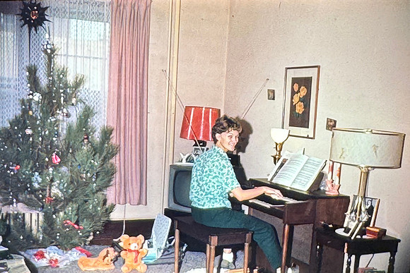 19651225 Belita playing piano