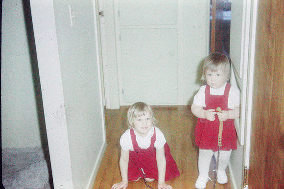 19640800 Alaina and Kecia playing dog maybe