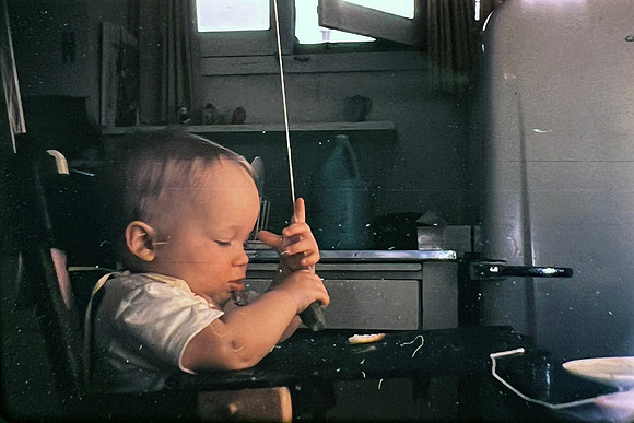 19660500 Erik 8 mos. has a dill pickle