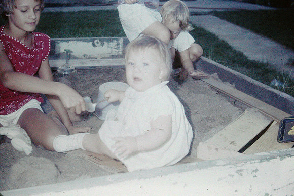 19631100 Jenelle playing with Kecia in sand