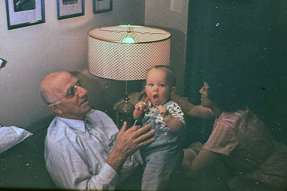 19660300 Grandpa Olsen holding Erik and Cleo