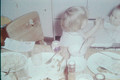 19630700 Alaina feeding Kecia