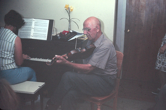 19660829 Nels Olsen on violin