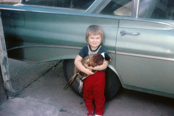 19641000 Kecia holding pheasant