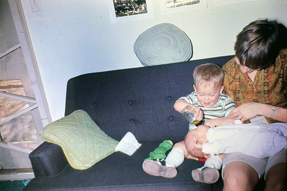 19670300 Belita and Erik giving Liesl a bottle