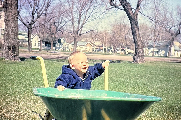 19660500 Erik 8 mos with wheel barrow