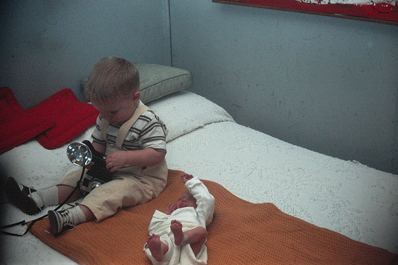19670210 Erik 16 mos with baby Liesl 10 days