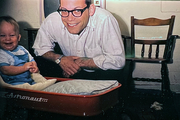 19660500 Erik 8 mos with Dick and new wagon